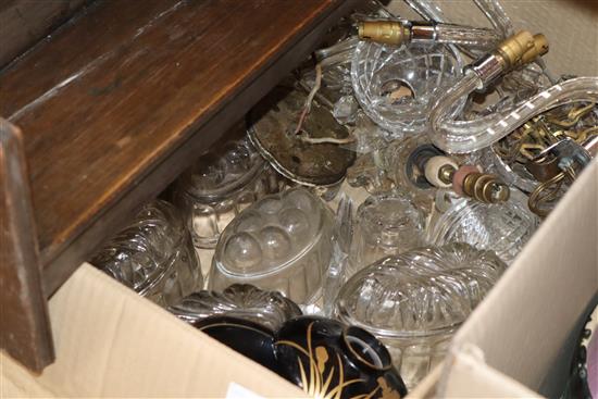 A collection of glass jelly moulds, cut glass wall lights, a book shelf and mixed broken oriental ceramics